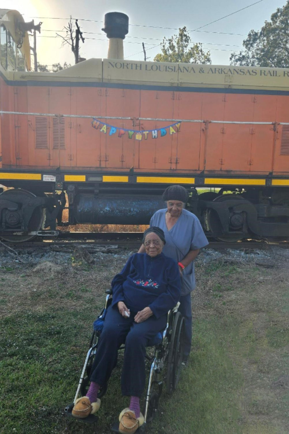 Ida Newbill with NLA locomotive